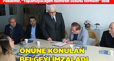 ÖNÜNE KONULAN BELGEYİ İMZALADI!