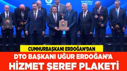 DTO BAŞKANI UĞUR ERDOĞAN’A HİZMET ŞEREF PLAKETİ